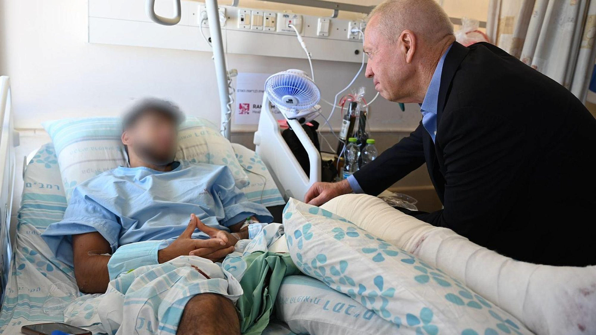 Israeli Defense Minister Yoav Gallant visits a soldier who was wounded in Jenin, June 20, 2023. Photo by Nicole Laskavi/Israeli Defense Ministry.