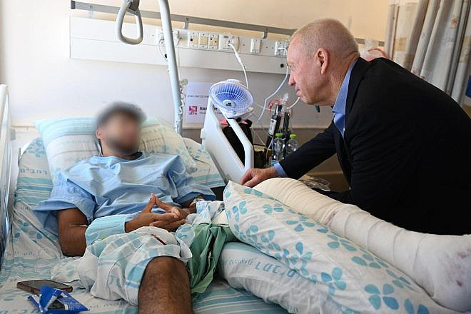 Israeli Defense Minister Yoav Gallant visits a soldier who was wounded in Jenin, June 20, 2023. Photo by Nicole Laskavi/Israeli Defense Ministry.