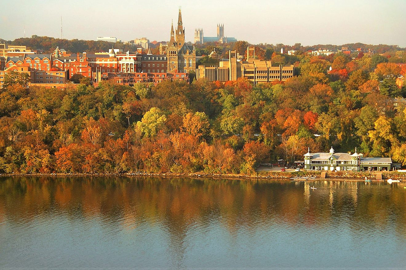 Georgetown University's main campus. Washington National Cathedral is visible above campus, and the Washington Canoe Club is in the lower right on the Potomac River. Credit: Patrickneil via Wikimedia Commons.
