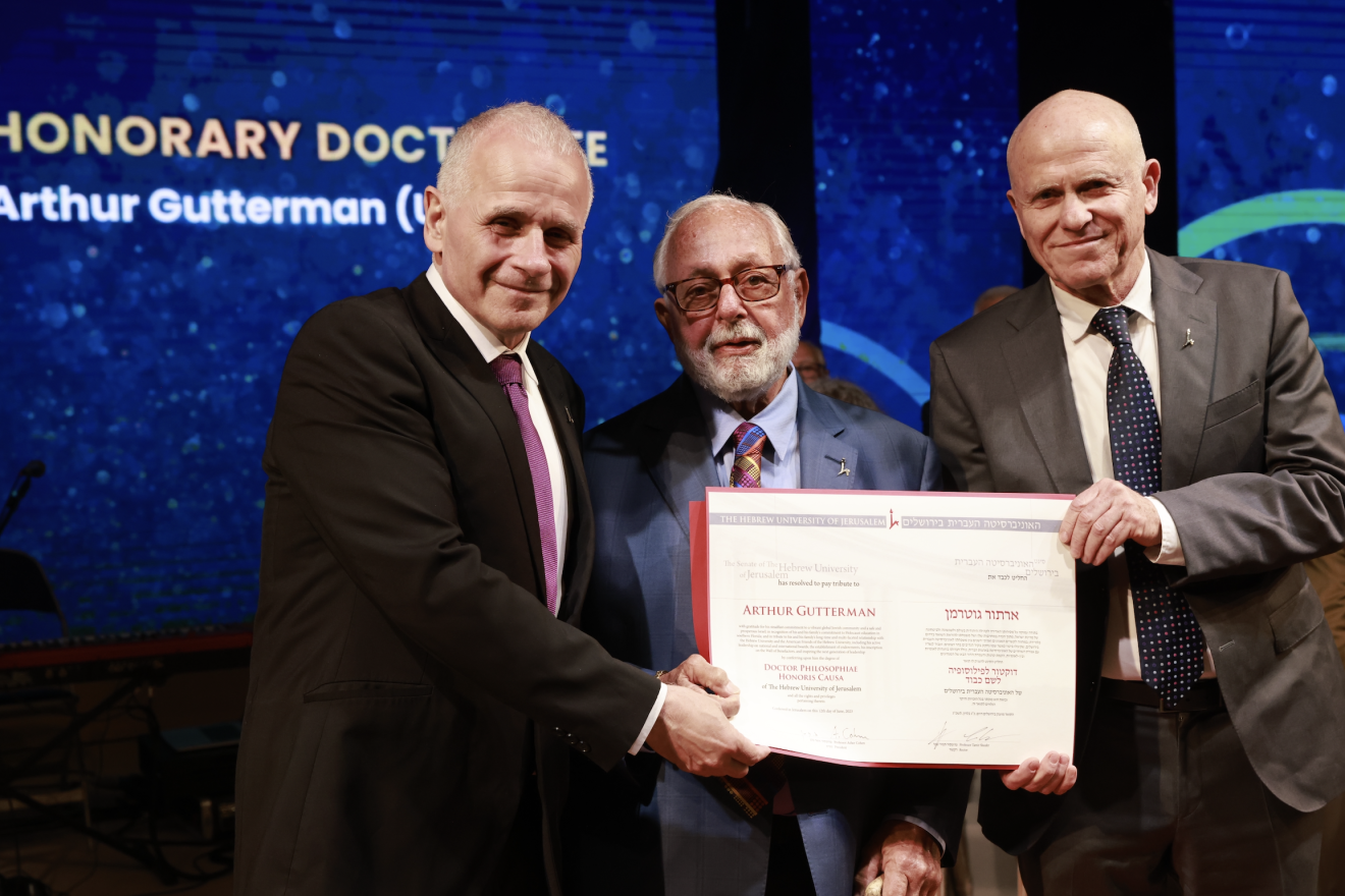 The Hebrew University of Jerusalem President Professor Asher Cohen (left) presented humanitarian, philanthropist, and businessman Arthur Gutterman with a prestigious Honorary Doctorate degree during the 86th Board of Governors Meeting on June 12, 2023, in Jerusalem. Professor Tamir Sheafer, Hebrew University Rector, is on his right. Credit: Yossi Zamir.