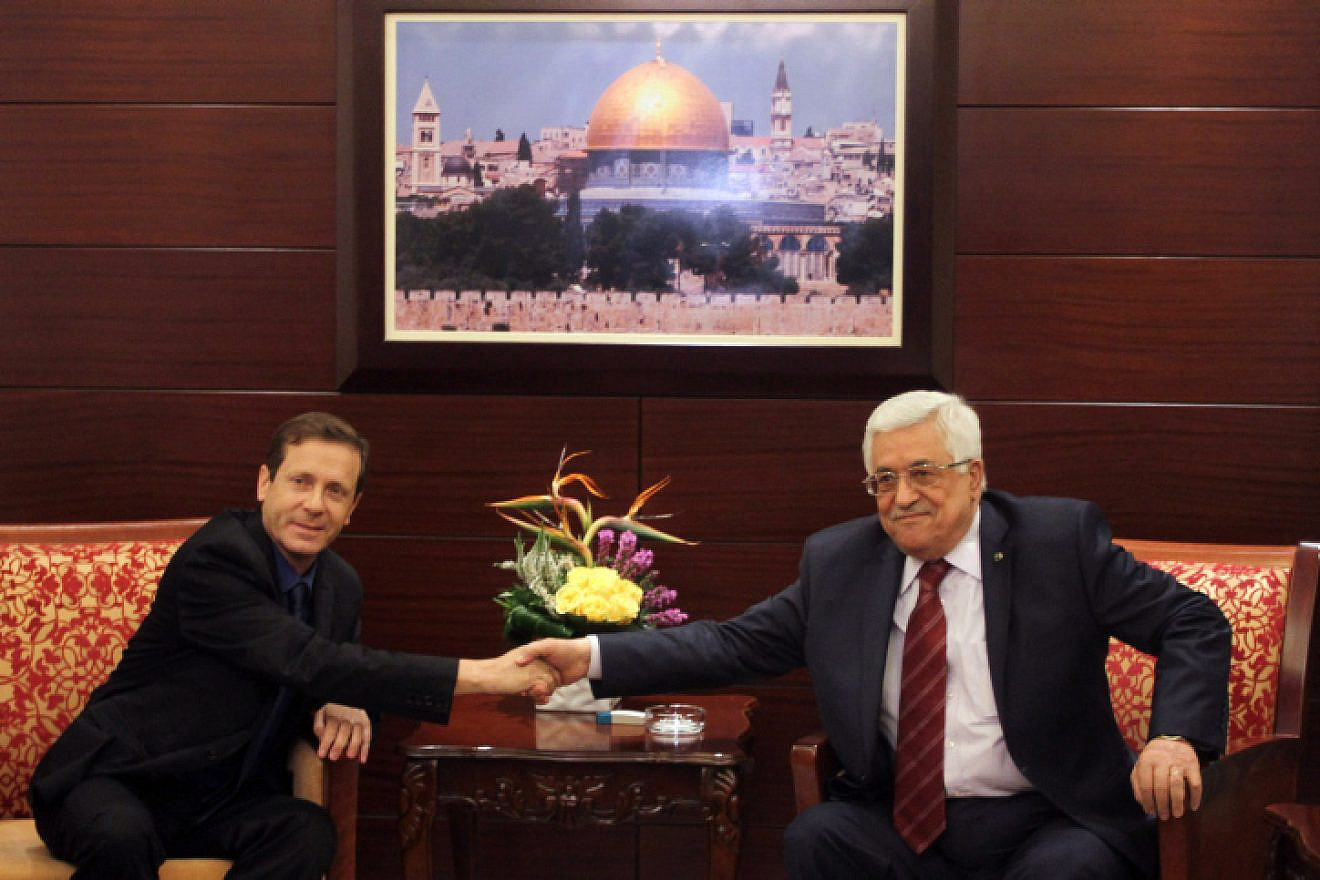 Newly elected Israeli Labor Party leader Isaac Herzog meets with Palestinian Authority President Mahmoud Abbas in Ramallah, Dec. 01, 2013. Photo by Issam Rimawi/Flash90.