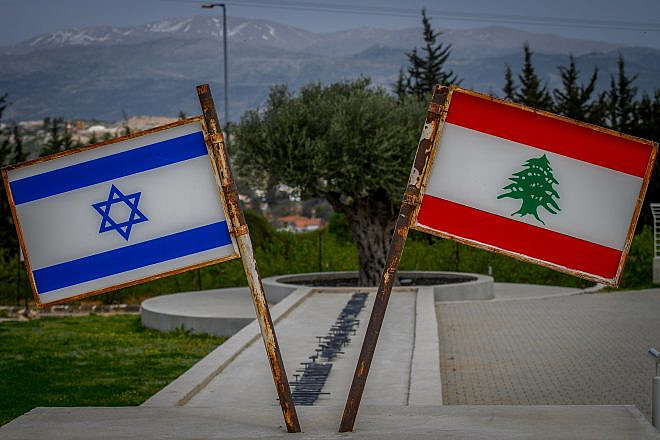 The Israeli and the Lebanese flag near the border with Lebanon in northern Israel on April 7, 2023. Photo by Ayal Margolin/Flash90.