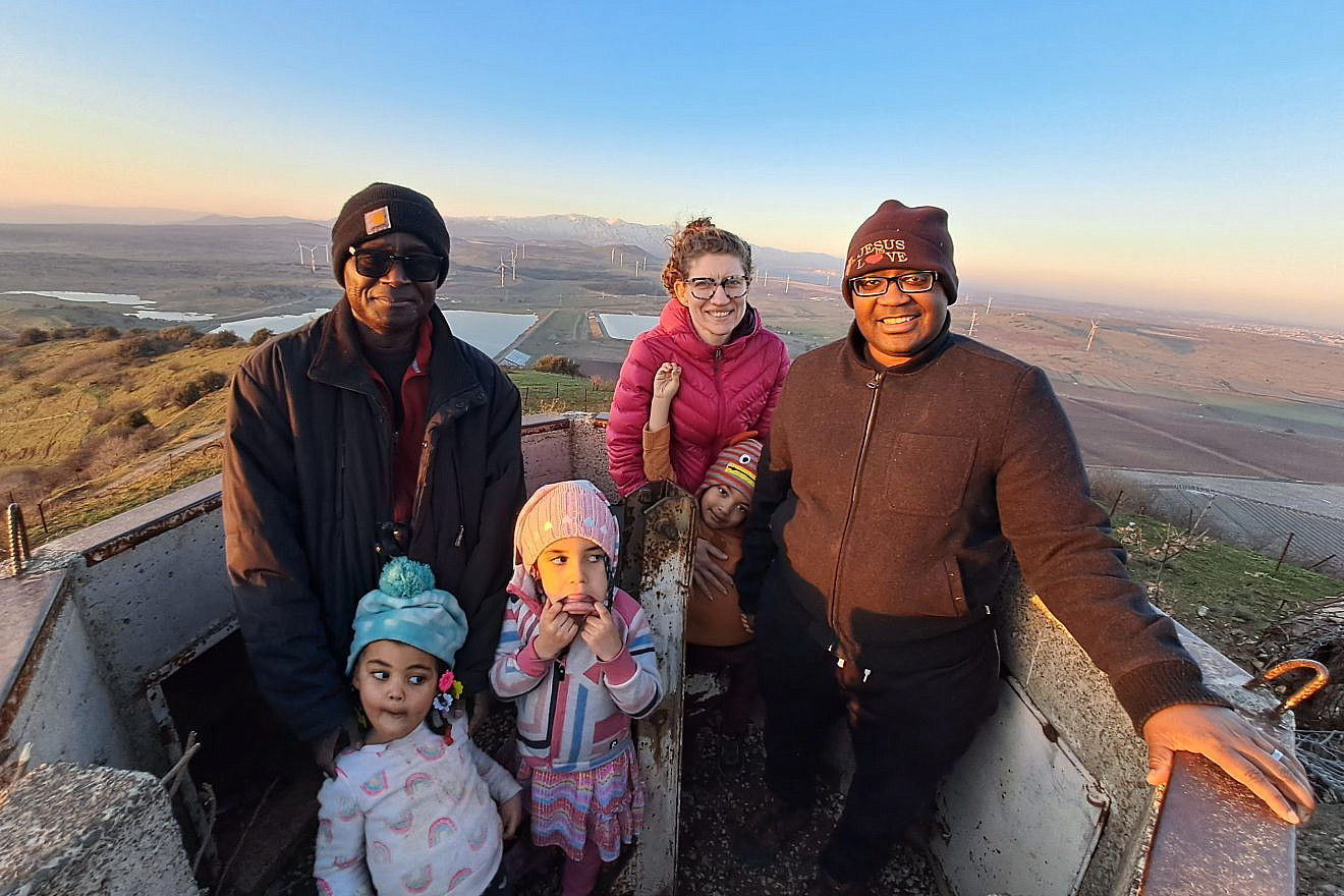 Quilen Blackwell (right), president and co-founder of Southside Blooms in Chicago, on a trip to Israel with his wife Hannah Bonham Blackwell, their three children and his father. Credit: Courtesy.