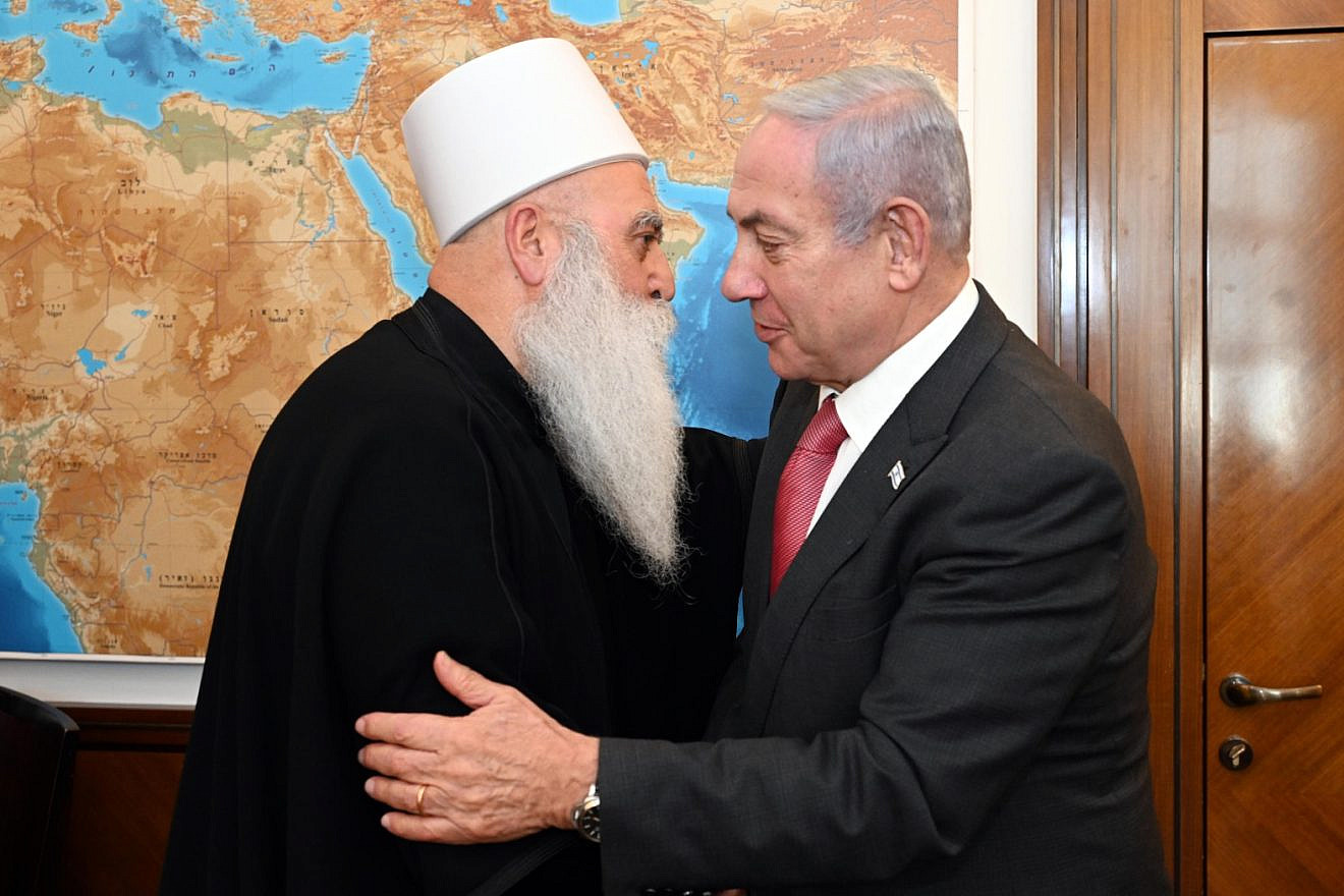 Israeli Druze spiritual leader Shaykh Mowafaq Tarif and Israeli Prime Minister Benjamin Netanyahu in Jerusalem, June 21, 2023. Photo by Haim Zach/GPO.