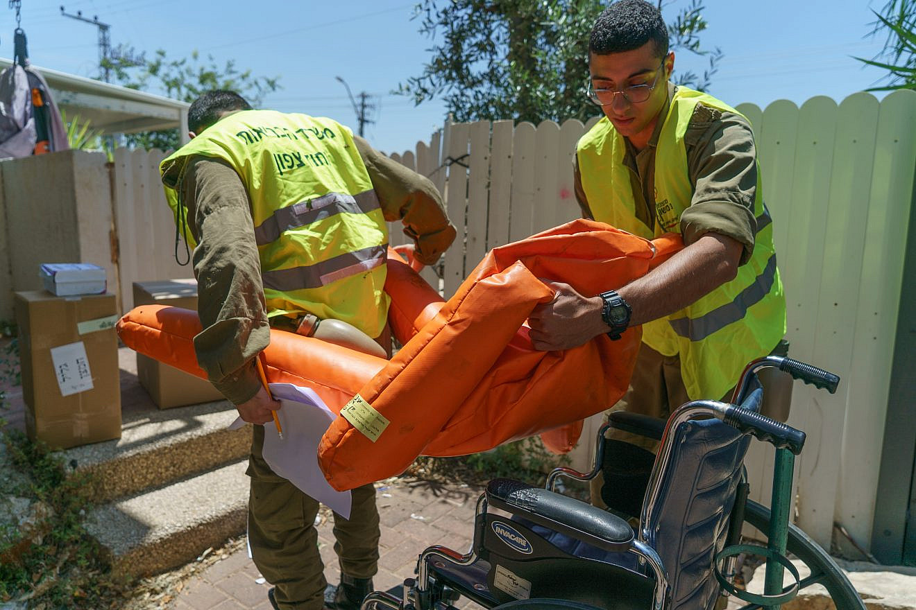 Israeli Navy personnel rehearsing the wartime evacuation of patients in Shlomi, in northern Israel, on June 6, 2023. Credit; IDF Spokespersons Unit.