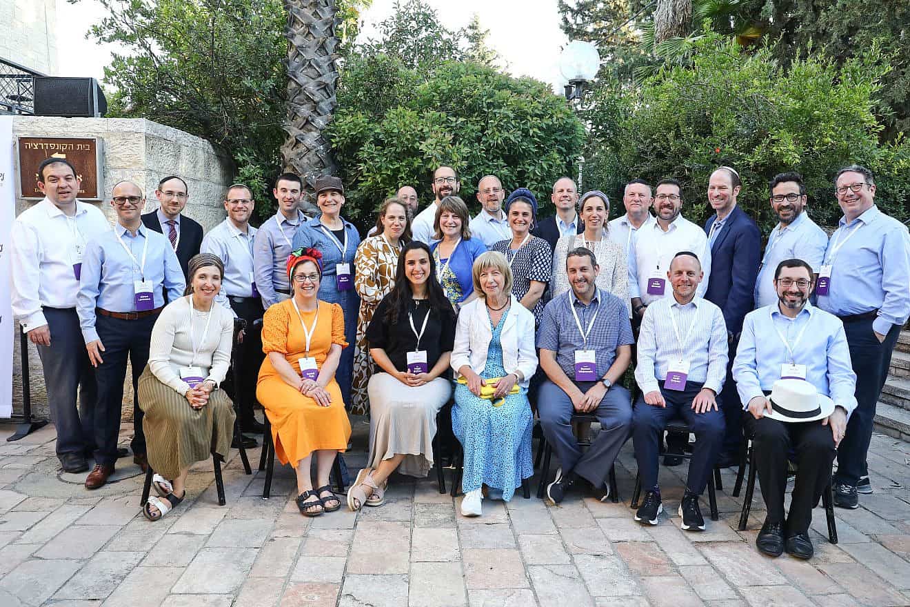 Scholars from around the world attend a conference in Jerusalem to further the legacy of the late Rabbi Jonathan Sacks, together with his wife, Lady Elaine Sacks (front row, center). Photo: Yonit Schiller.