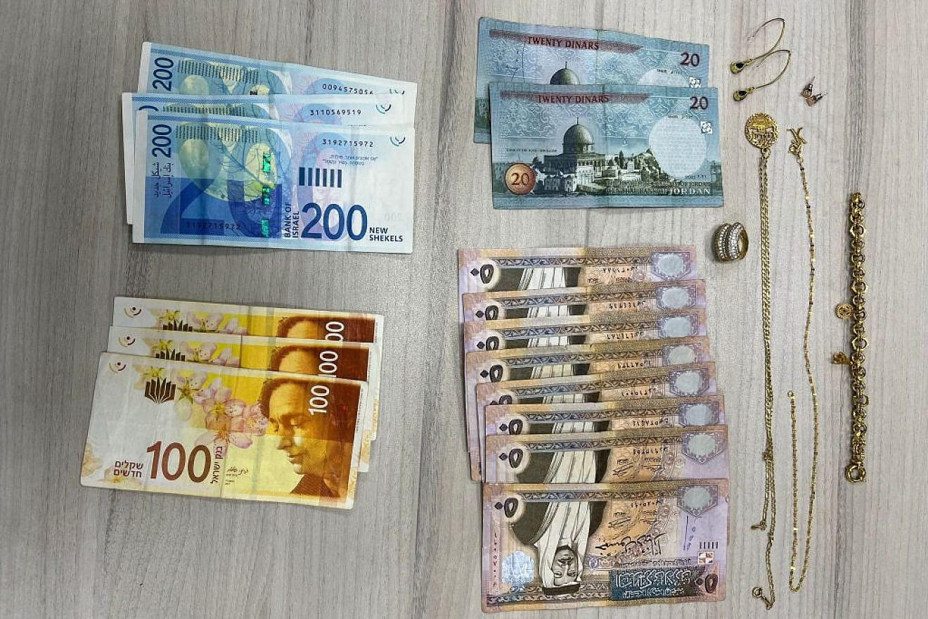 Cash and jewelry seized by police during a crackdown on recipients of P.A. terror stipends in eastern Jerusalem, June 26, 2023. Credit: Israel Police Spokesperson.