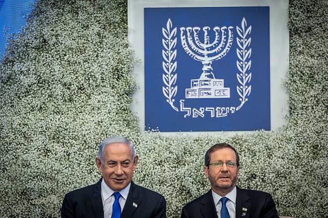 Israeli President Isaac Herzog and Israeli Prime Minister Benjamin Netanyahu at event for outstanding soldiers as part of Israel's 75th Independence Day celebrations, at the President's Residence in Jerusalem on April 26, 2023. Photo by Yonatan Sindel/Flash90.