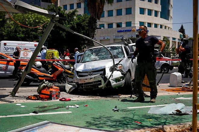 The scene of a Palestinian terrorist attack that wounded seven people on Pinchas Rosen Street in Tel Aviv's Ramat Hahayal neighborhood, July 4, 2023. Photo by Miriam Alster/Flash90.