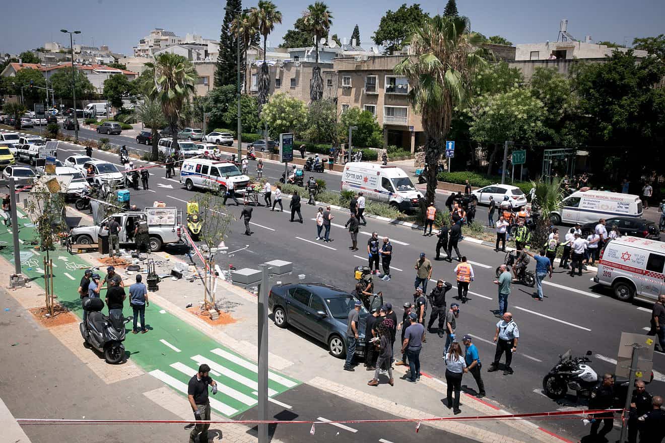 Police and rescue forces at the scene of a car ramming terror attack in north Tel Aviv on June 4, 2023. Photo by Miriam Alster/Flash90.