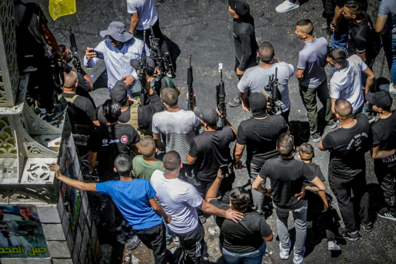 Armed Palestinians march after an Israeli military operation in Jenin, July 5, 2023. Photo by Nasser Ishtayeh/Flash90.
