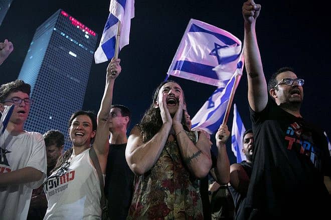 Israeli demonstrators protest against judicial reform in Tel Aviv, July 18, 2023. Photo: Miriam Alster/Flash90