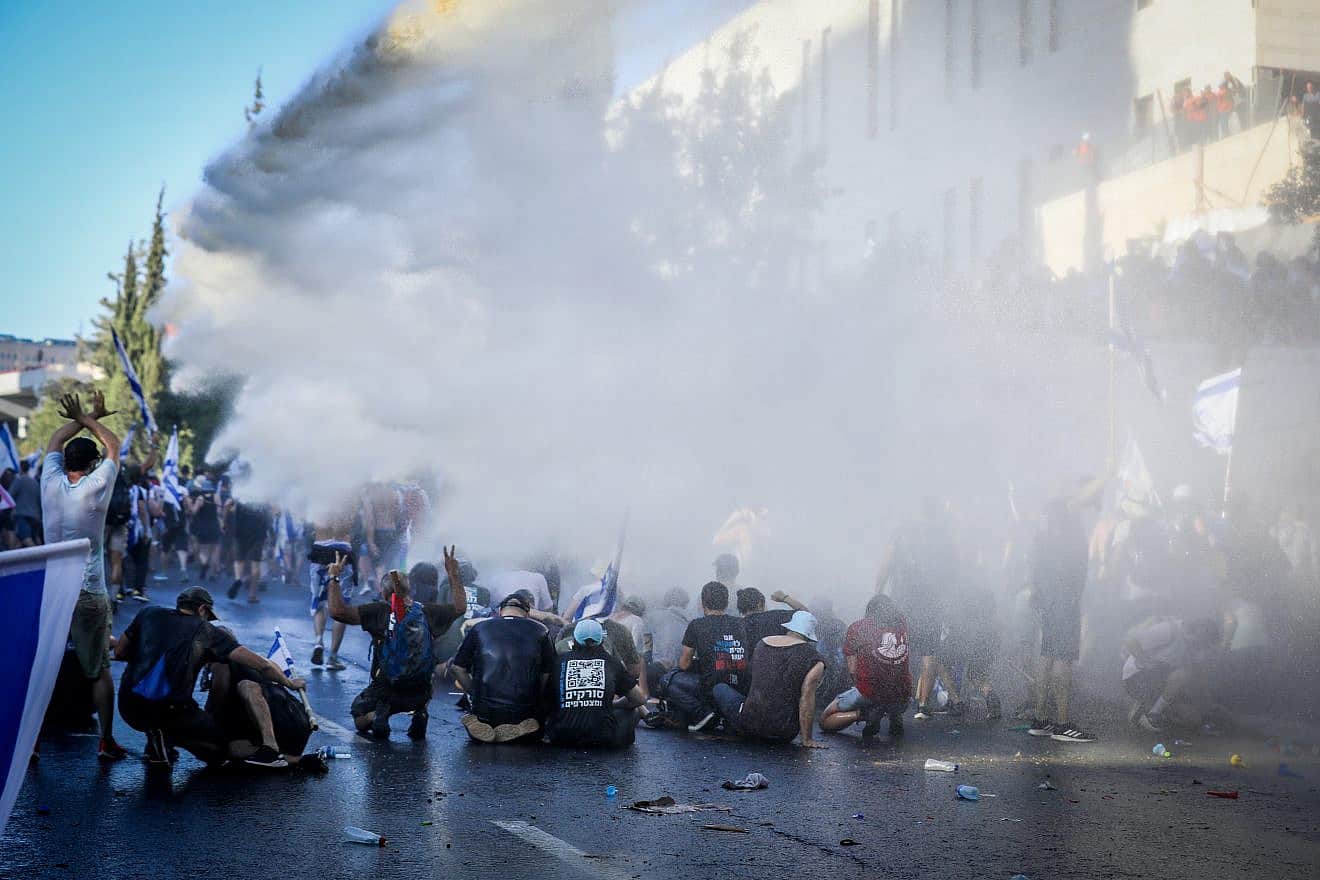 Anti-judicial reform protesters and activists clash with Israeli police as they block Begin Road near the Knesset in Jerusalem on July 24, 2023. Photo by Noam Revkin Fenton/Flash90.