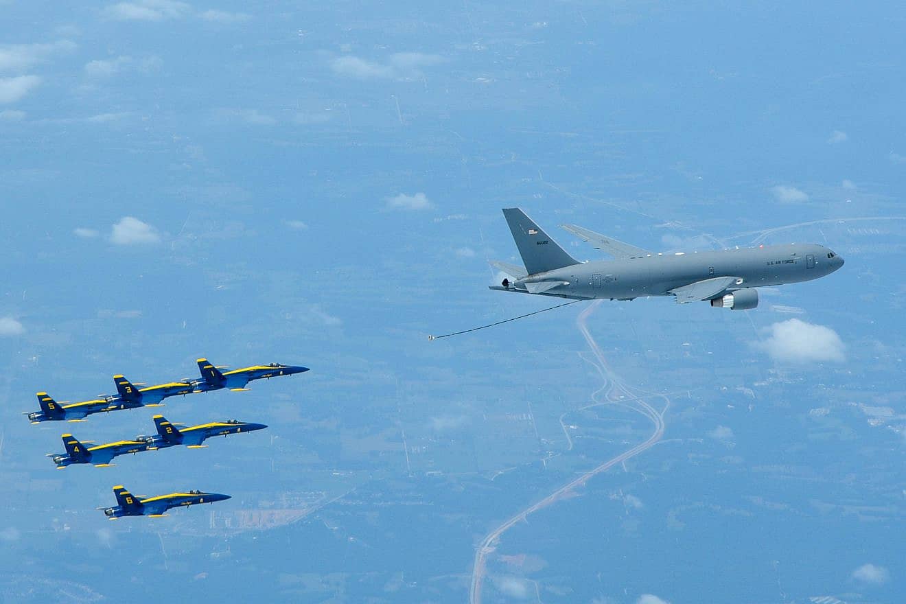 A KC-46 Pegasus assigned to the 931st Air Refueling Wing, McConnell Air Force Base, Kan., lines up to refuel an U.S. Navy Blue Angels F/A-18 Hornet, July 1, 2020 over South Dakota. U.S. Air Force photo by Maj. Andrea Morris