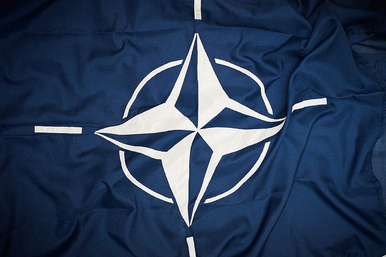 The NATO flag. Photo: Sergeant Paul Shaw LBIPP (Army)/MOD via Wikimedia Commons.