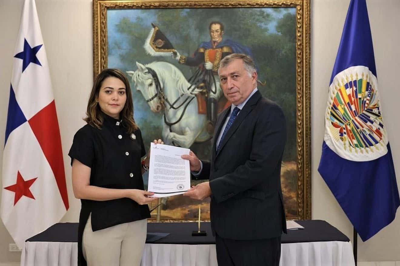 Janaina Tewaney Mencomo (left), Panama’s foreign minister, and Fernando Lottenberg, commissioner to monitor and combat antisemitism at the Organization of American States, participate in a July 25, 2023 ceremony marking Panama's adoption of the IHRA working definition of antisemitism. Courtesy: B'nai B'rith International District 23.