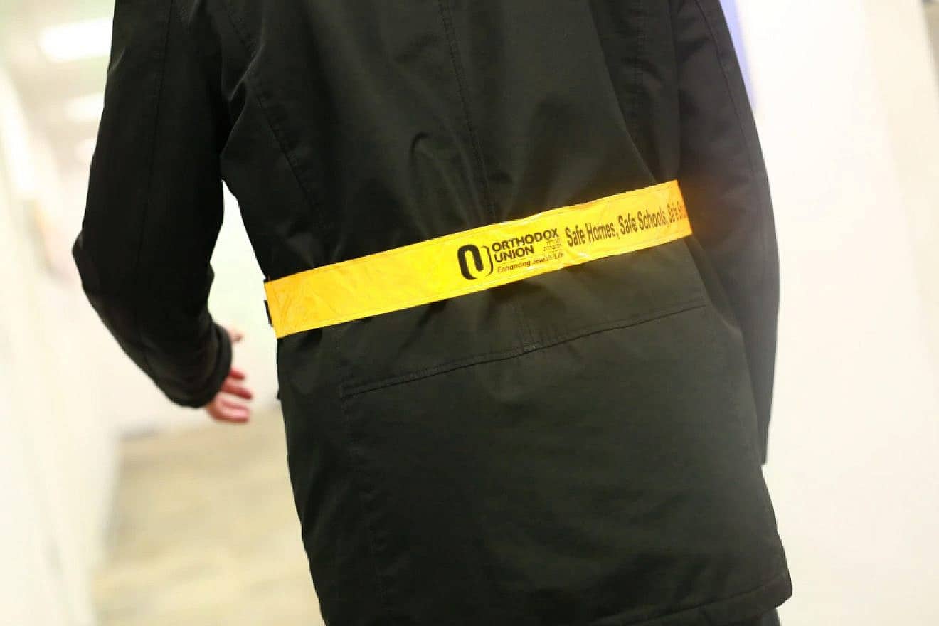 The Orthodox Union’s reflective belt, meant to protect pedestrians walking home from shul at night from vehicles. Photo courtesy of Orthodox Union.