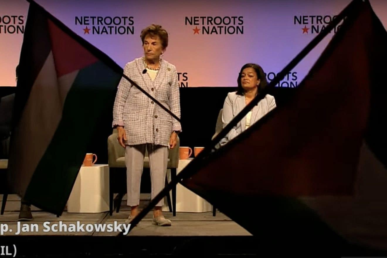 Protesters wave Palestinian flags and chant as Rep. Jan Schakowsky (D-Ill.) tries to speak at the Netroots Nation conference in Chicago on July 15, 2023. Source: YouTube screenshot.