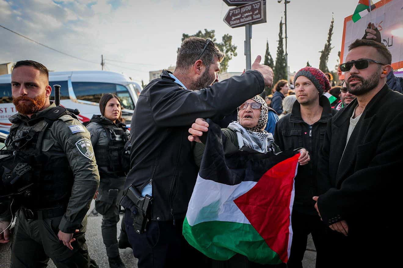 Palestinian and left-wing activists protest against the expulsion of Arab families from their homes in the eastern Jerusalem neighborhood of Sheikh Jarrah on Jan. 13, 2023. Photo by Jamal Awad/Flash90.