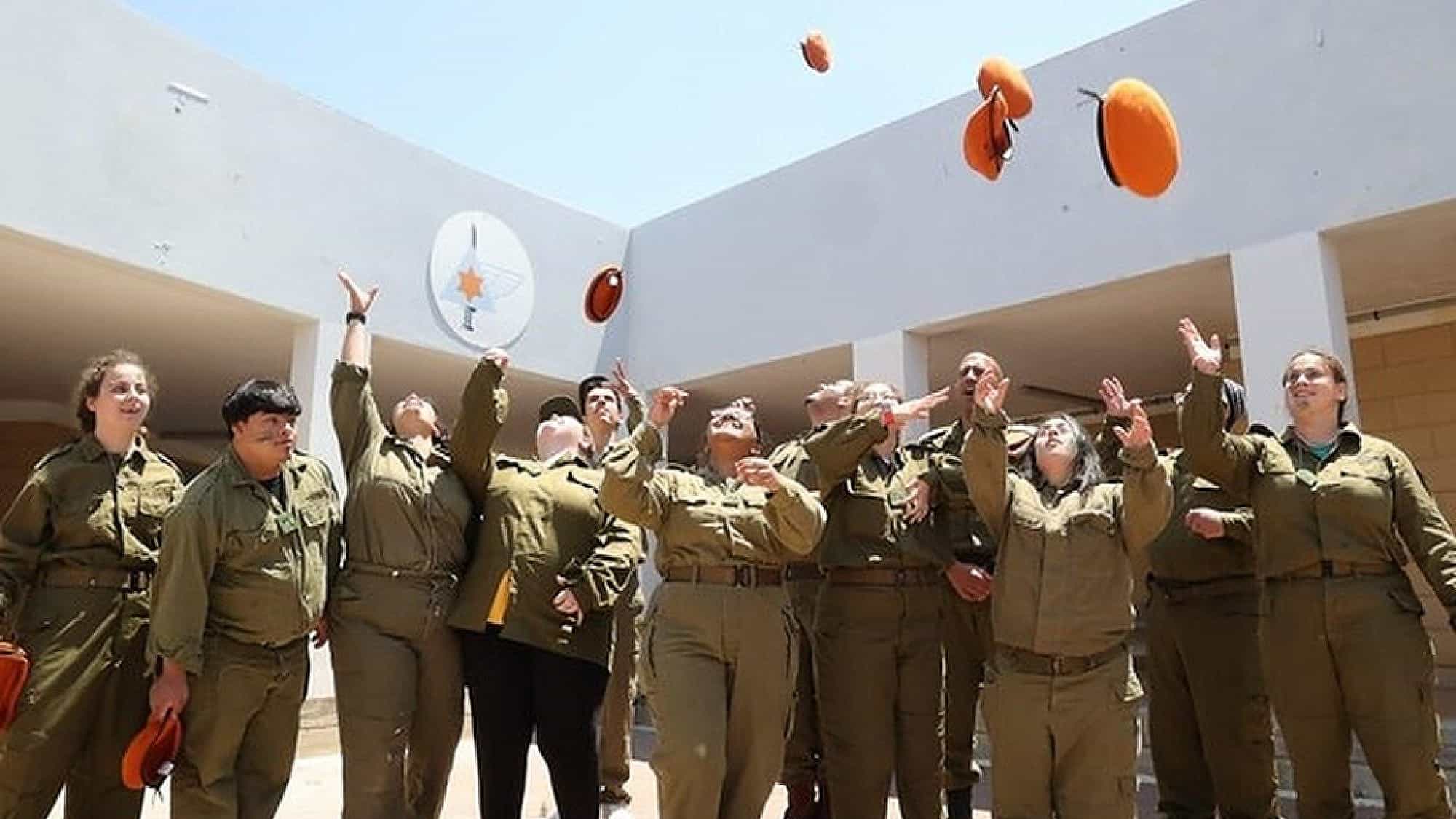 Volunteers from the Special In Uniform program celebrate after completing their "Beret March" at the beginning of their voluntary service in the Israel Defense Forces. Photo by Dani Rife/Special In Uniform.