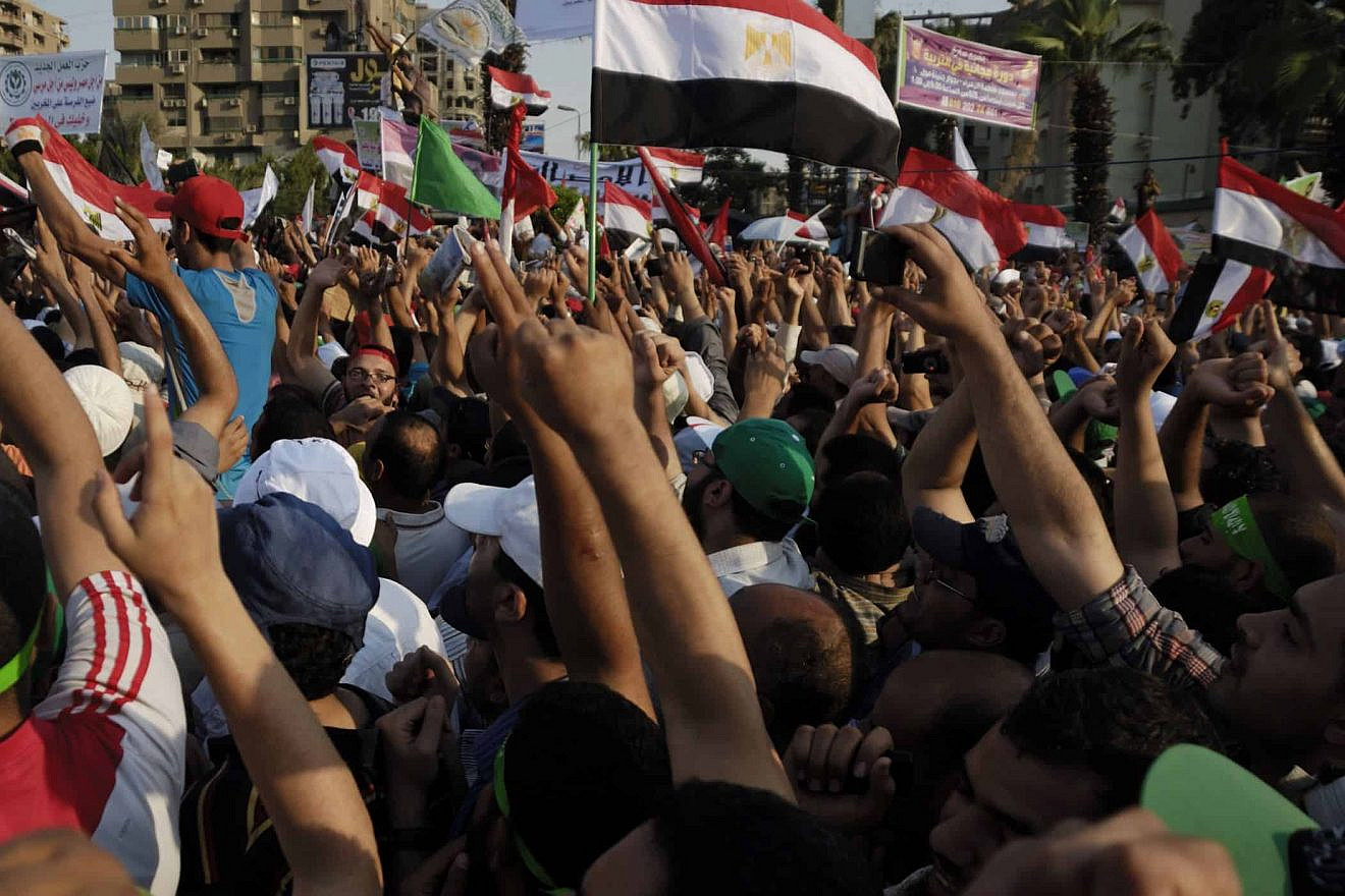 More than 2 million Islamist supporters gather in Rabaa el-Adawia Square in Cairo to support then-Egyptian President Mohamed Morsi on June 21, 2013. Credit: Tom Bert/Shutterstock.
