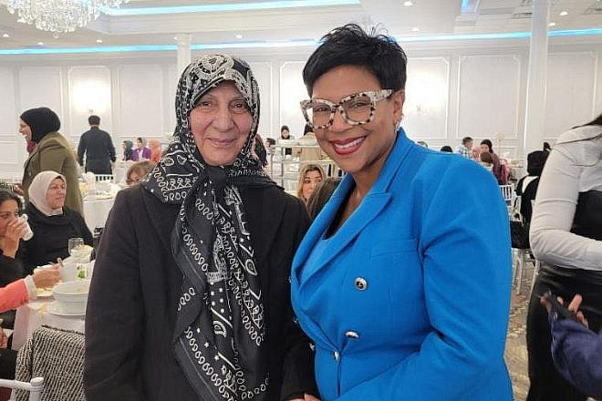 Michigan State Sen. Sylvia Santana (right) with a constituent. Source: Facebook