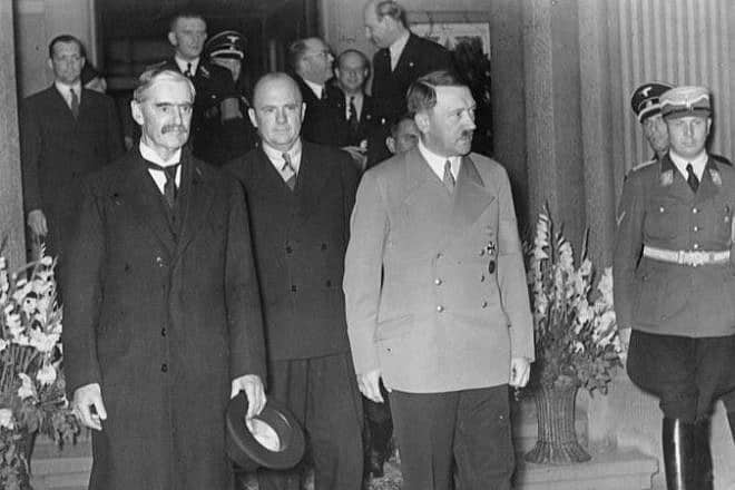 British Prime Minister Neville Chamberlain and German Chancellor Adolf Hitler leave their meeting at Bad Godesberg, Germany, on Sept. 23 1938. Source: German Federal Archives via Wikimedia Commons.