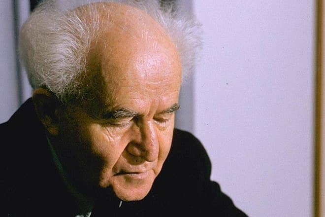 Israeli Prime Minister David Ben-Gurion looks through documents in his Tel Aviv office, January 1959. Photo by Fritz Cohen, Photography Department of Israel’s Government Press Office via Wikimedia Commons..