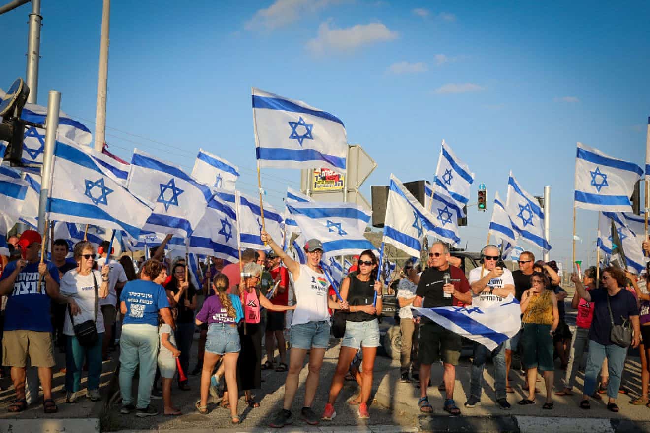 A protest against the Israeli government's judicial overhaul at Nahalal Junction, northern Israel, on Aug. 26, 2023. Photo by Anat Hermony/Flash90.
