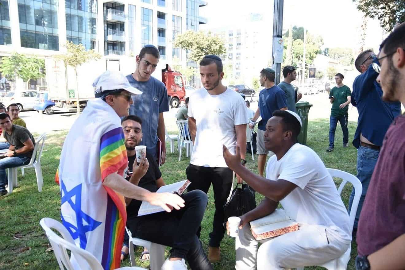 Israelis study Torah at a tent on Kaplan Street in Tel Aviv, Aug. 10, 2023. Source: Facebook.
