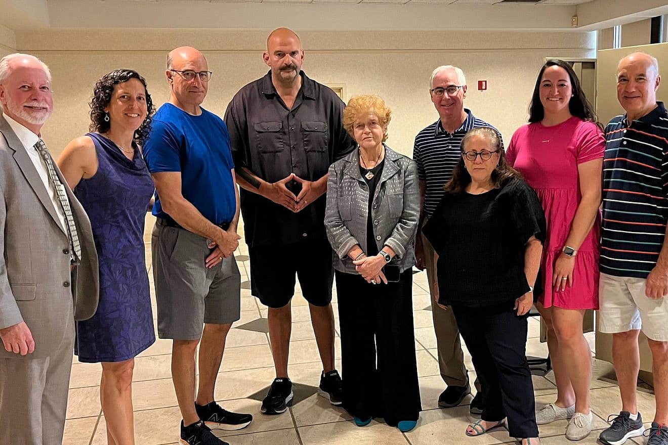 Sen. John Fetterman (D-Pa.) and Deborah Lipstadt, special envoy to monitor and combat antisemitism (center), visit the Tree of Life Synagogue in Pittsburgh, spending time with families and Rabbi Jeffrey Myers (left) on Aug. 29, 2023. Source: Sen. John Fetterman X/(formerly Twitter).