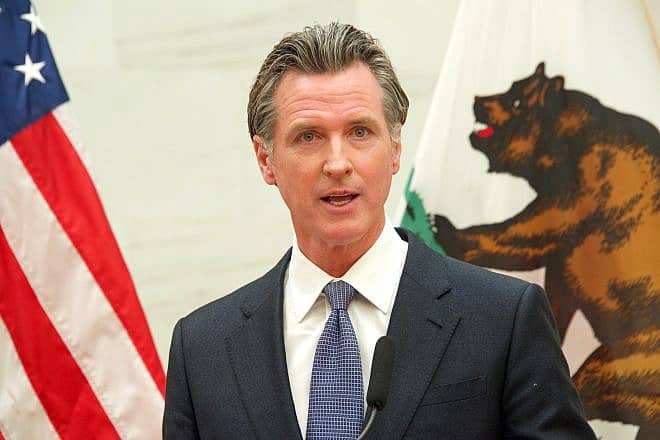 California Gov. Gavin Newsom offers an update in San Francisco about the state's progress on the “Kindergarten to College” program, April 26, 2022. Credit: Sheila Fitzgerald/Shutterstock.