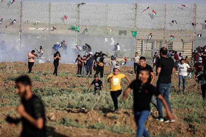 Gazans riot at the border fence with Israel, Aug. 21, 2023. Credit: Majdi Fatchi/TPS.