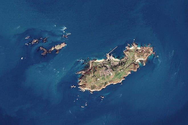 A satellite view of Alderney, the northernmost of the inhabited Channel Islands. Credit: Copernicus Sentinel-2, ESA via Wikimedia Commons.