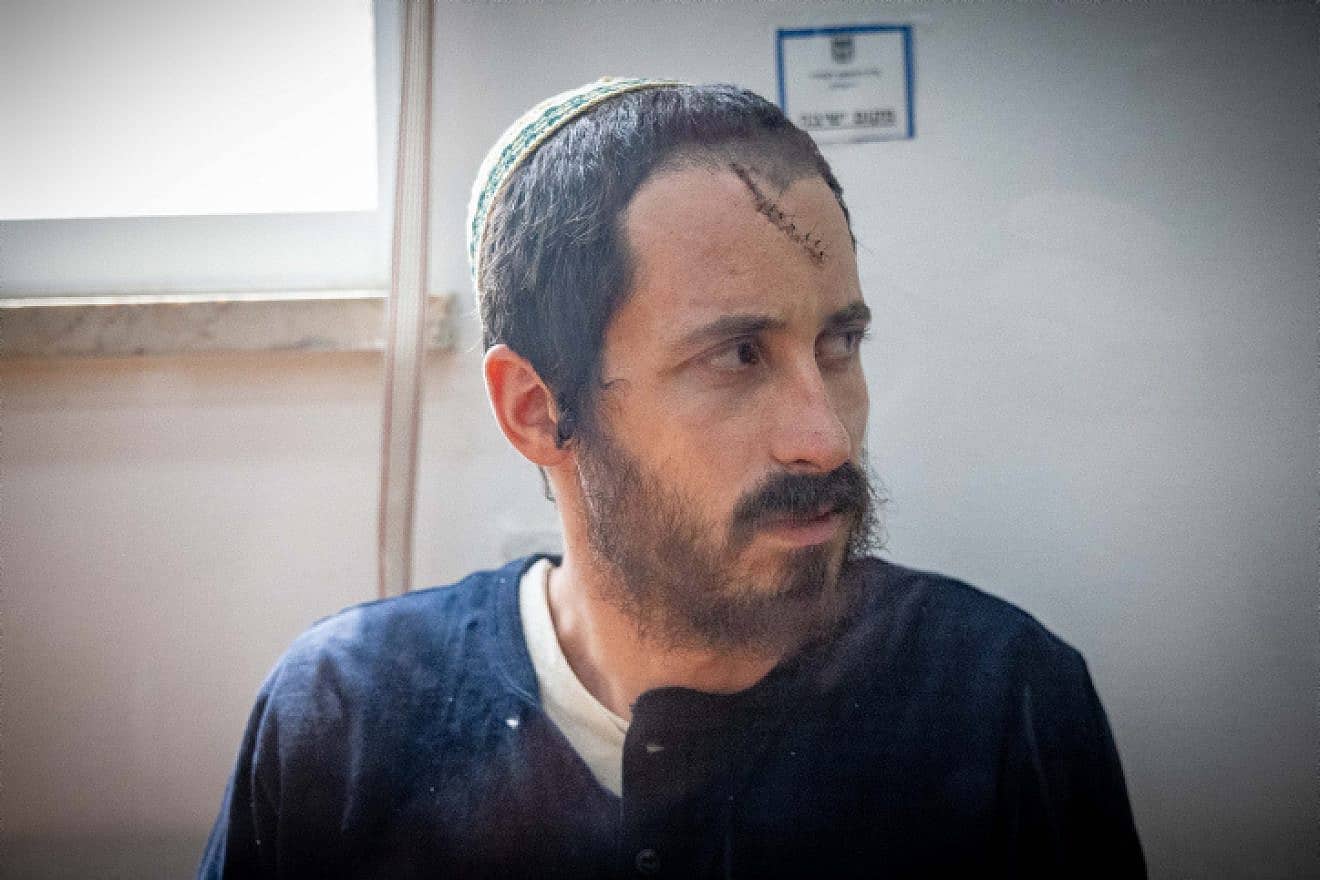 Yehiel Indore, suspected of killing Palestinian Kosai Ma'atan, arrives for a hearing at the Jerusalem District Court, Aug. 14, 2023. Photo by Chaim Goldberg/Flash90.