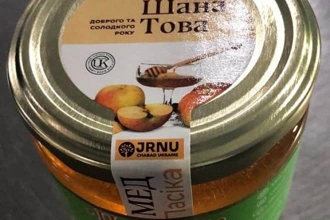 Chabad rabbis have arranged for a special production run of 15,000 bottles of kosher honey from a honey factory outside Kiev, following import disruptions caused by the ongoing war with Russia. Credit: Chabad.org/News.