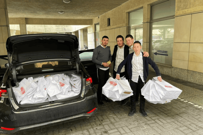 Young helpers associated with Chabad of Poland have been packing bags of kosher food to deliver to Polish and Ukrainian Jewish families and individuals before the start of Rosh Hashanah on Sept. 15, 2023. Credit: Courtesy.