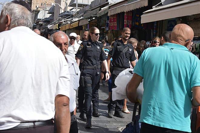 Police patrol Jerusalem's Mahane Yehuda Market during the 2022 High Holidays. Credit: Israel Police.