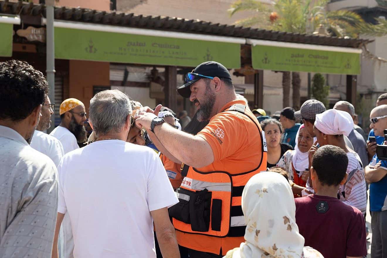 United Hatalah volunteer Erez Gollan works with local community members in earthquake-stricken Marrakech, Sept. 10, 2023. Credit: Courtesy.