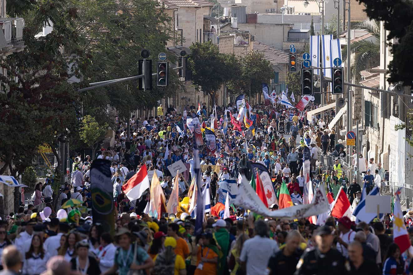 Thousands of Christian pilgrims parade in Jerusalem, marking the Jewish holiday of Sukkot and the Feast of Tabernacles, Oct. 13, 2022. Photo by Yonatan Sindel/Flash90.