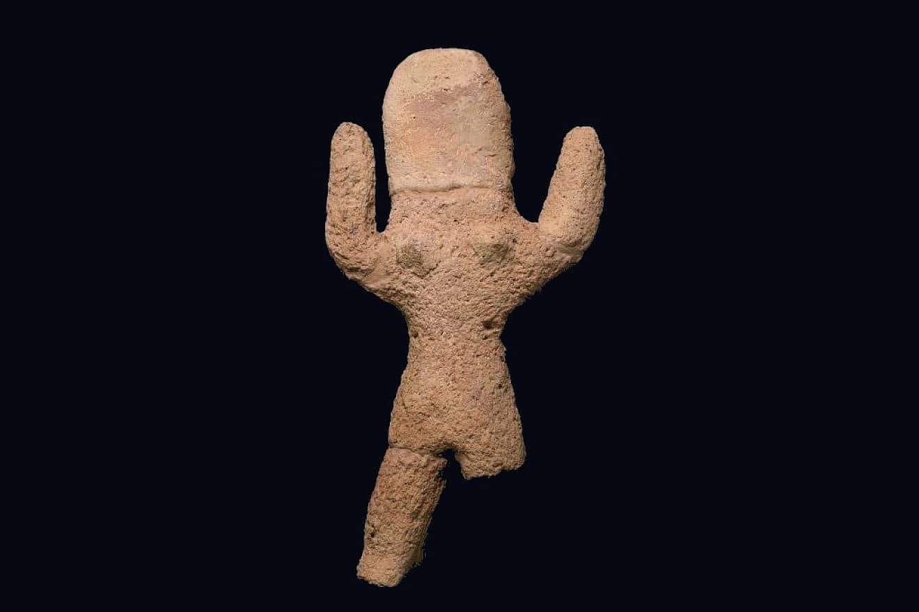 Clay female figurine. Photo: Clara Amit, Israel Antiquities Authority.