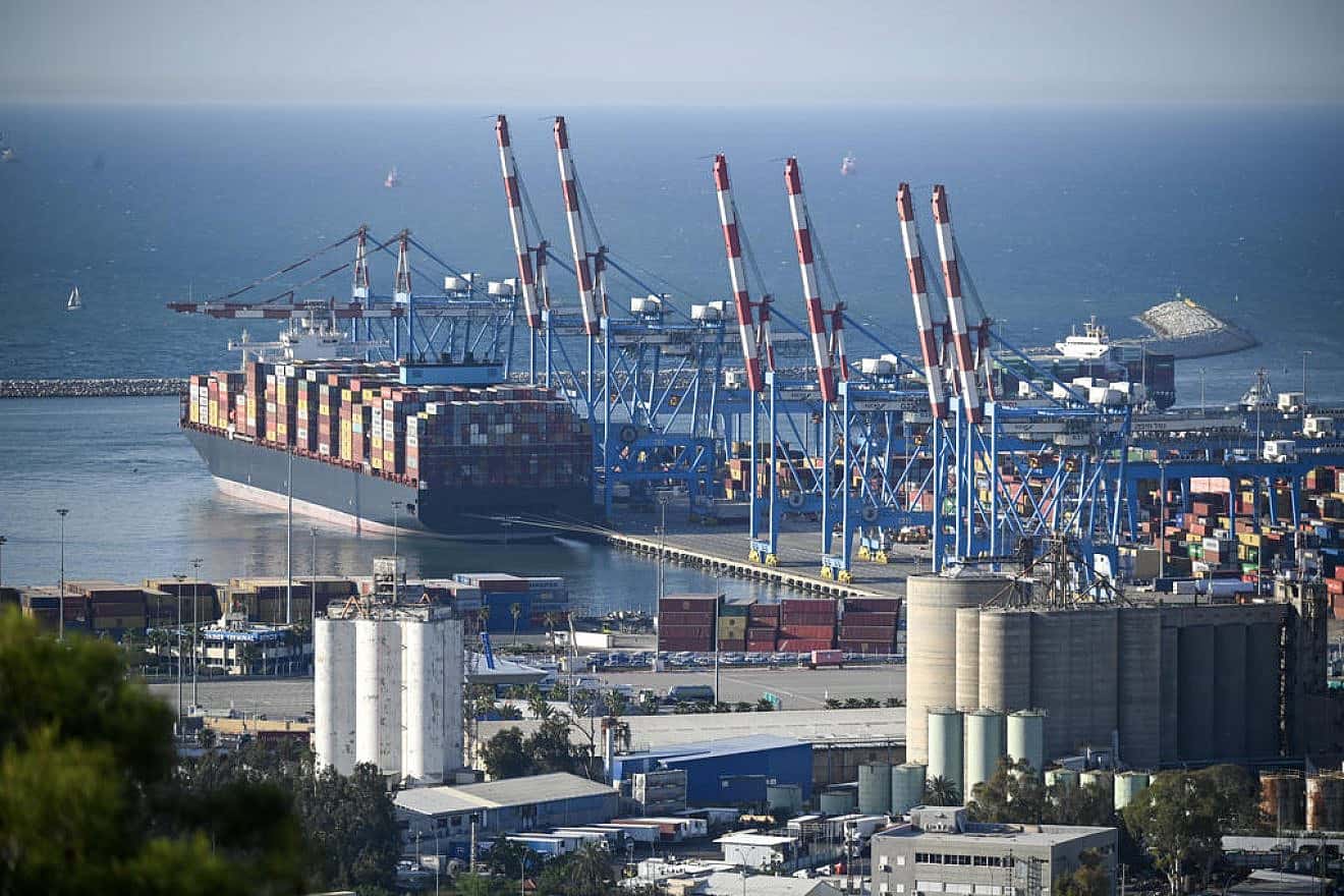 A container ship in Haifa Port, May 27, 2023. Photo by Yoav Dudkevitch/TPS.