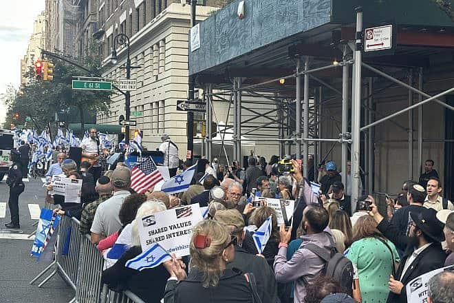 A rally in favor of unity (foreground), and across the street, a rally against the Israeli government's judicial reform in Manhattan on Sept. 21, 2023. Photo by Elishama Marmon.