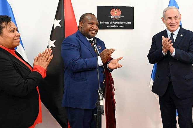 Israeli Prime Minister Benjamin Netanyahu meets with Papua New Guinea Prime Minister James Marape and his wife, Rachael Marape, as they unveil the sign marking a new embassy in Jerusalem for the South Pacific country on Sept. 5, 2023. Credit: GPO/Haim Zach.