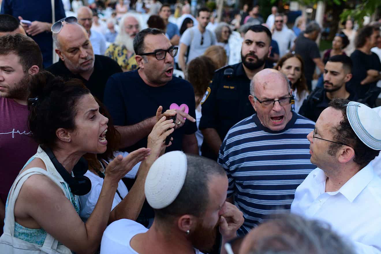 Secular and religious Jews argue at Dizengoff Square in Tel Aviv, Sept. 24, 2023. Photo by Tomer Neuberg/Flash90.