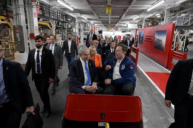 Israeli Prime Minister Benjamin Netanyahu and his wife, Sara, tour a Tesla plant in Fremont, Calif., with Tesla CEO Elon Musk, Sept. 18, 2023. Photo by Avi Ohayon/GPO.
