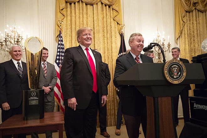 Sen. Lindsey Graham, joined by then-President Donald Trump, welcomes the national champion Clemson University Tigers football team to the White House, Jan. 14, 2019. Photo by Joyce N. Boghosian/The White House.