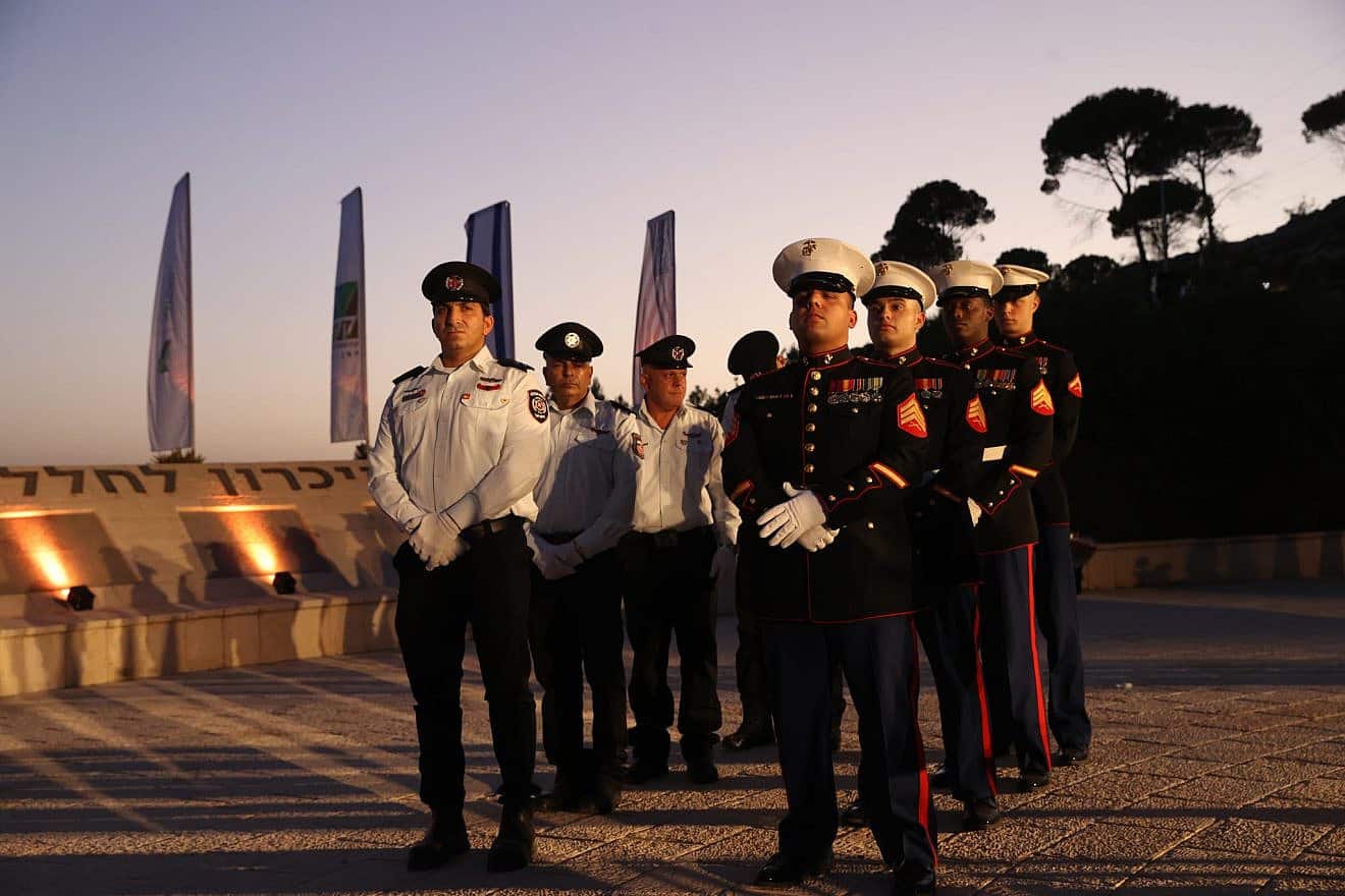 U.S. and Israeli uniformed servicemembers stand shoulder to shoulder at the 9/11 Living Memorial in Jerusalem