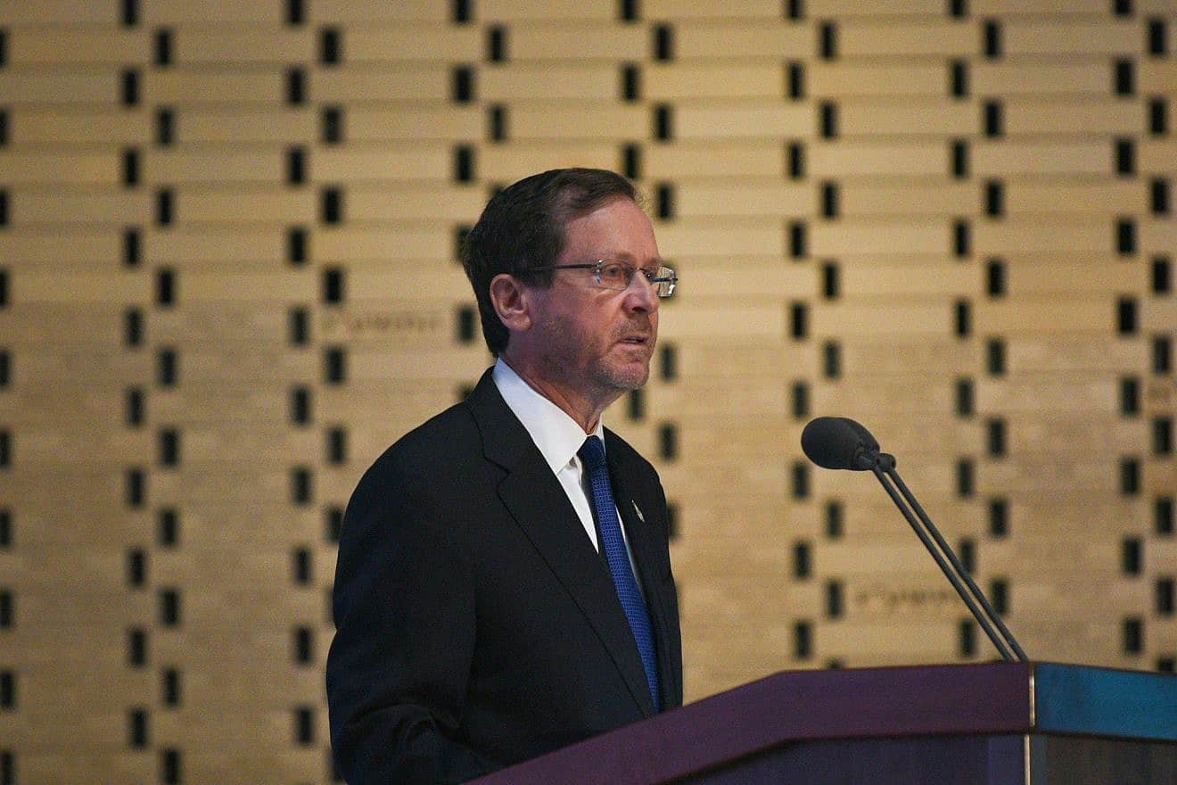 Israeli President Isaac Herzog addresses the state ceremony marking 50 years since the Yom Kippur War, held at the military cemetery at Jerusalem's Mount Herzl, Sept. 26, 2023. Photo by Yoav Dudkevitch/TPS.