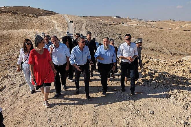 Israeli lawmakers tour an illegal Palestinian city being constructed in the Judean Desert south of Jerusalem, Sept. 21, 2023. Credit: Courtesy.